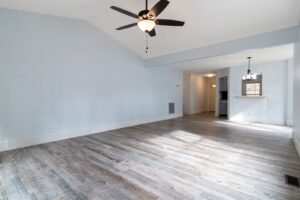Bright empty living room with hardwood floors ready for pre move in cleaning in Marietta, GA